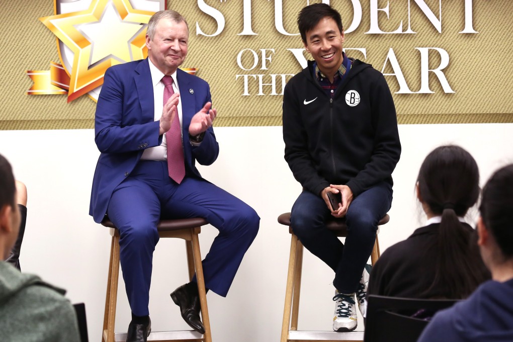South China Morning Post CEO Gary Liu (right) and Hong Kong Jockey Club CEO Winfried Engelbrecht-Bresges share tips with students. Photo: Jonathan Wong