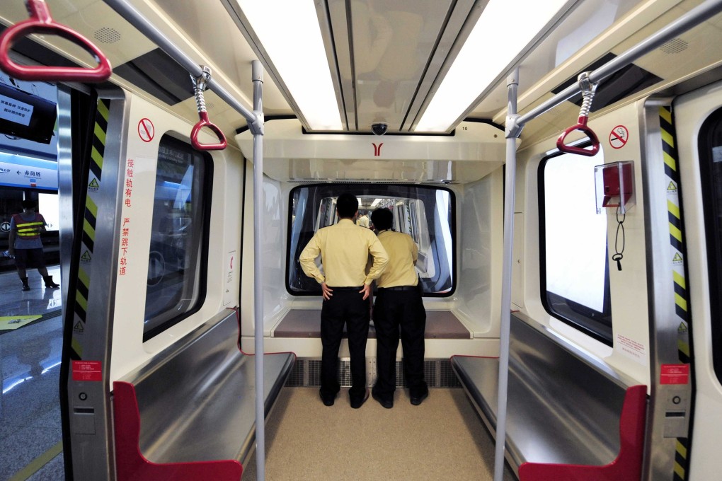 Workers prepare for a test run of a subway system in Guangzhou in 2010. In recent years, Guangzhou has developed at a pace unmatched by some regional cities, including Taipei and Taichung. Photo: Xinhua