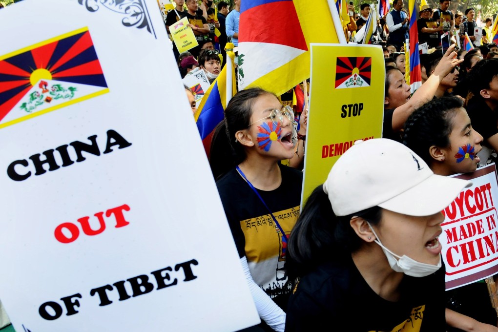 Tibetans living in exile in India take part in a protest against China on Sunday, on the annual Tibetan Uprising Day commemorating the 1959 uprising against Chinese rule. Photo: EPA-EFE