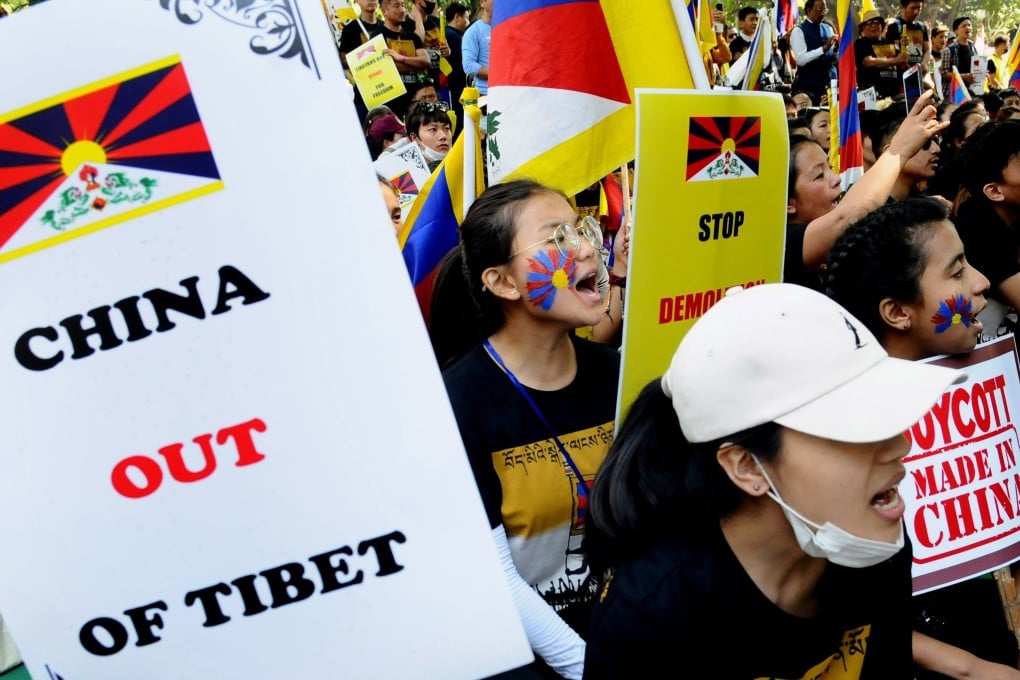 Tibetans living in exile in India take part in a protest against China on Sunday, on the annual Tibetan Uprising Day commemorating the 1959 uprising against Chinese rule. Photo: EPA-EFE