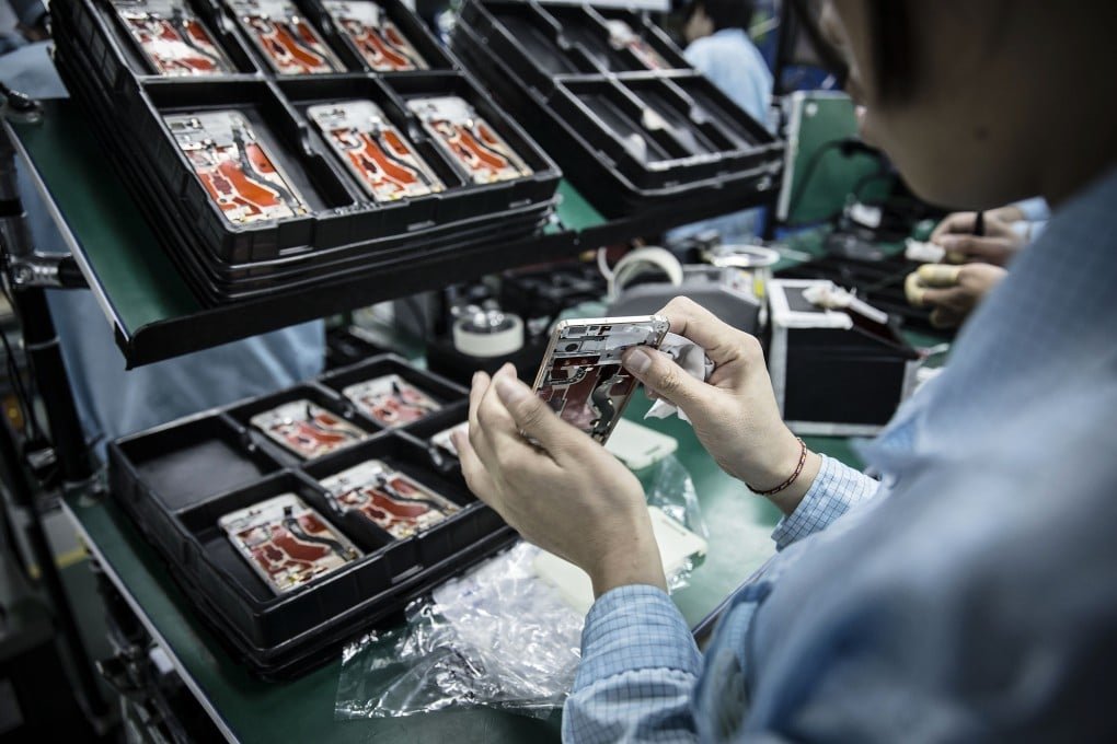 A OnePlus handset being assembled in Dongguan, China in 2015. (Picture: Bloomberg)