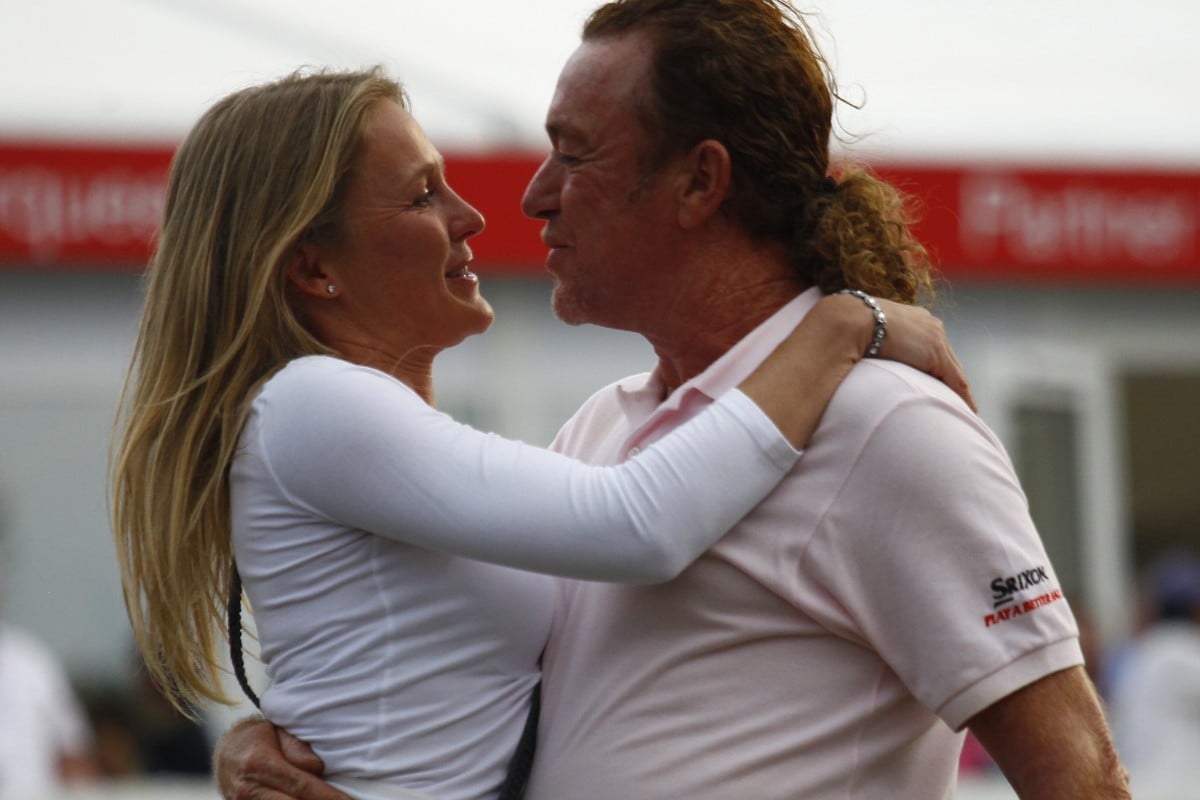 Hong Kong Open winner Miguel Angel Jimenez with his girlfriend Susann. Photo: AFP