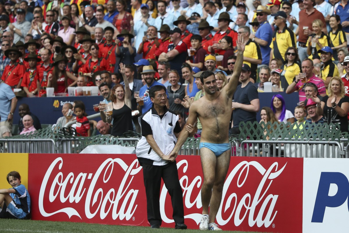 The obligatory streaker. At least have the balls, pardon the pun, to get the whole lot out. Photo: Felix Wong