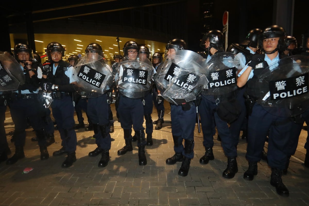 Demonstrators clash with riot police outside the Legislative Council in Admiralty. Photo: Edmond So