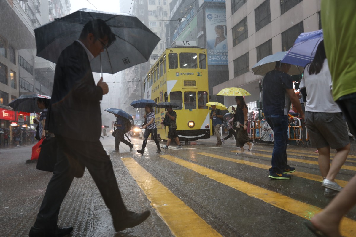 Rain pounds Hong Kong streets in Wan Chai. Photo: Tory Ho