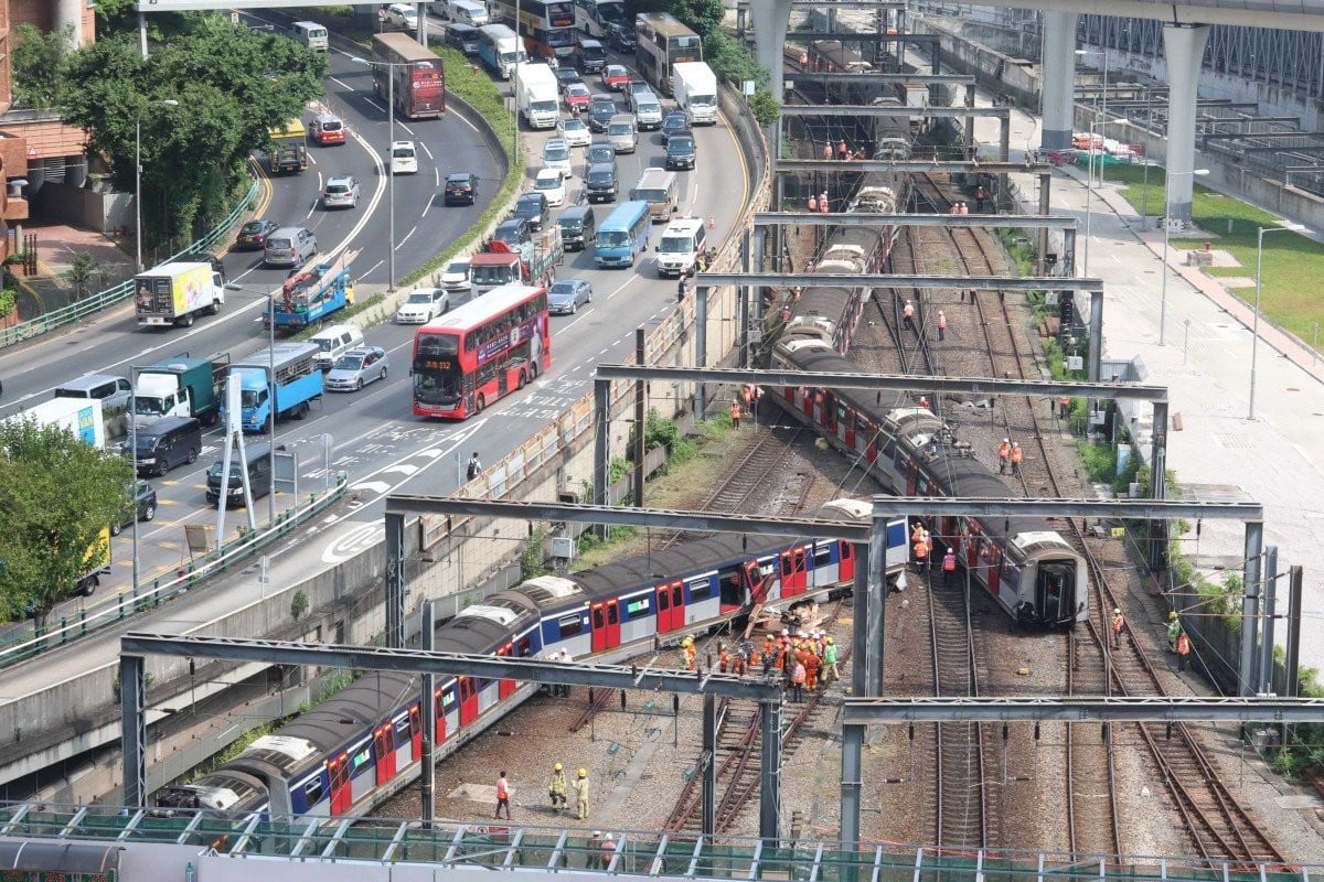 An MTR train carrying passengers derailed on the East Rail line -- a first for the world-class commuter system. MTR shares fell more than 1 per cent today. Photo: Felix Wong