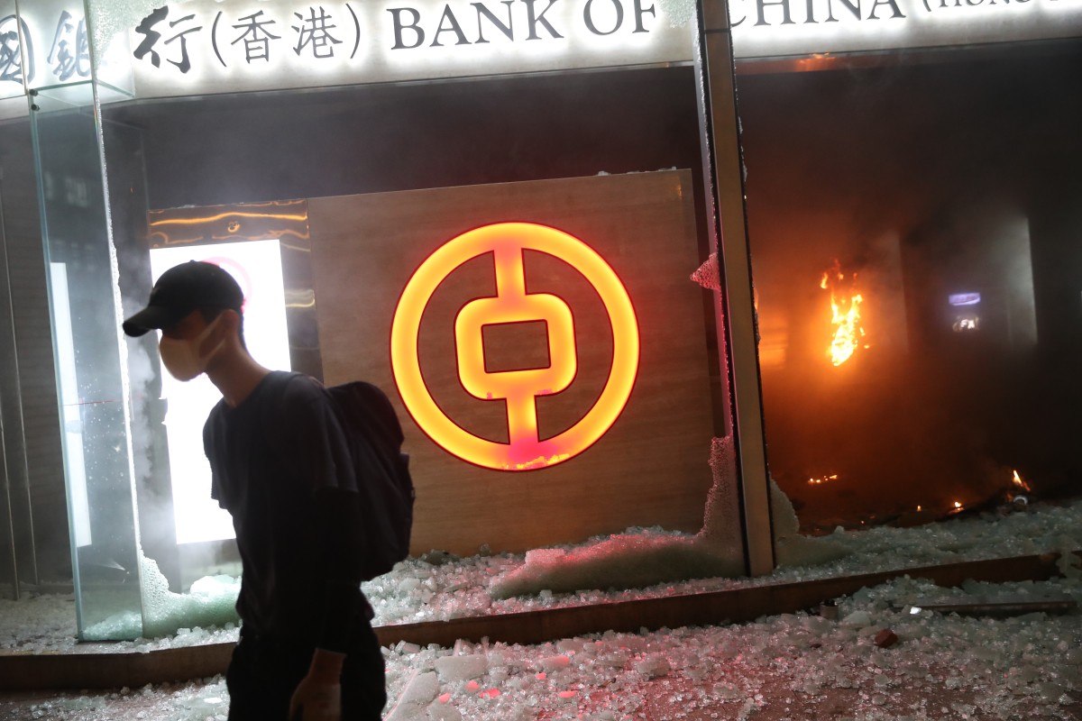 A Bank of China in Tsuen Wan is smashed and set alight. Photo: Winson Wong