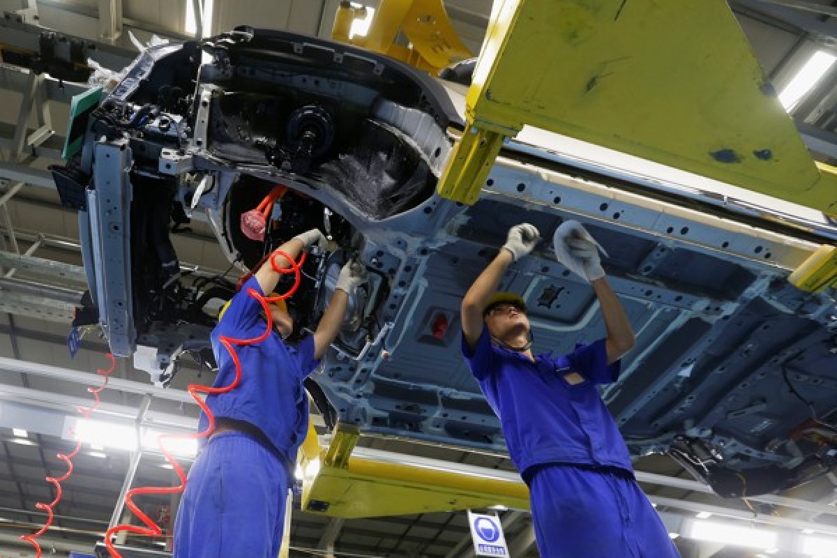 BYD has struggled as Beijing scaled back subsidies aimed at stimulating sales of electric vehicles. Above, a BYD assembly plant in Shenzhen. Photo: Reuters