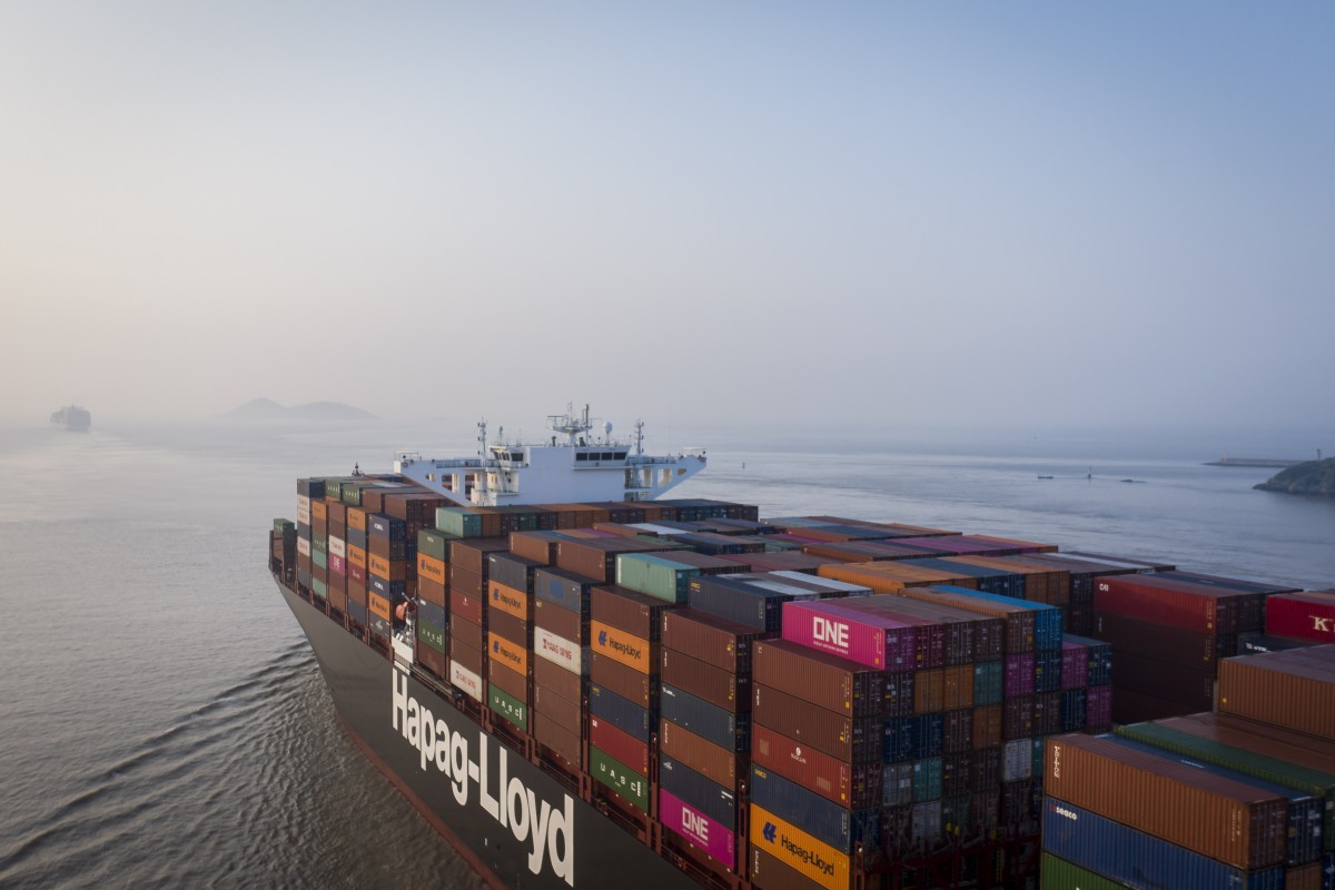 The Hapag-Lloyd AG Leverkusen Express sails out of the Yangshan Deepwater Port, operated by Shanghai International Port Group, in this aerial photograph taken in Shanghai on August 7, 2019. Photo: Bloomberg 