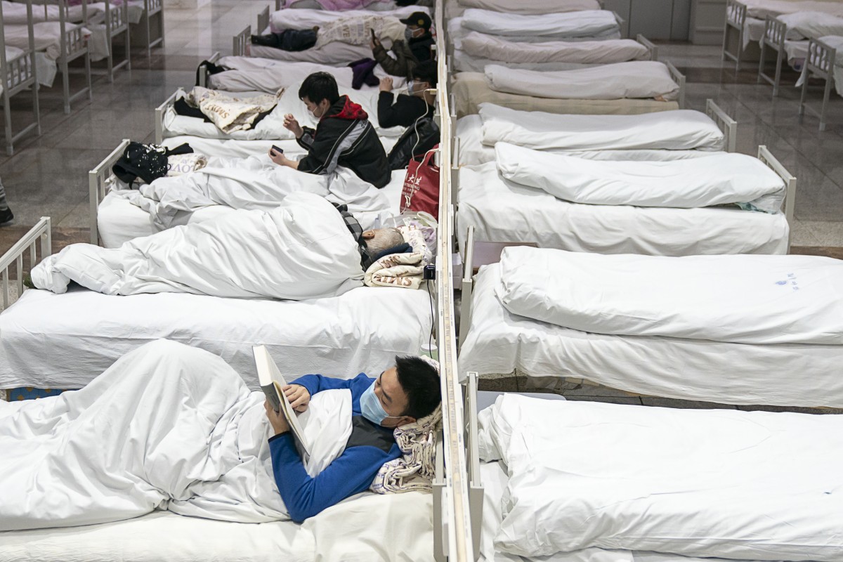 Patients infected with the novel coronavirus are seen at a makeshift hospital converted from an exhibition center in Wuhan, central China’s Hubei province on February 5. Photo: Xinhua