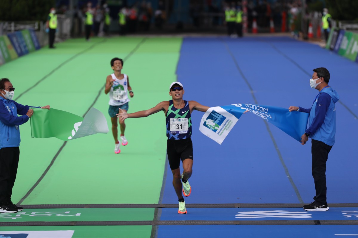 Wong Kai-lok wins the 2021 Standard Chartered Hong Kong Marathon. Photo: Nora Tam