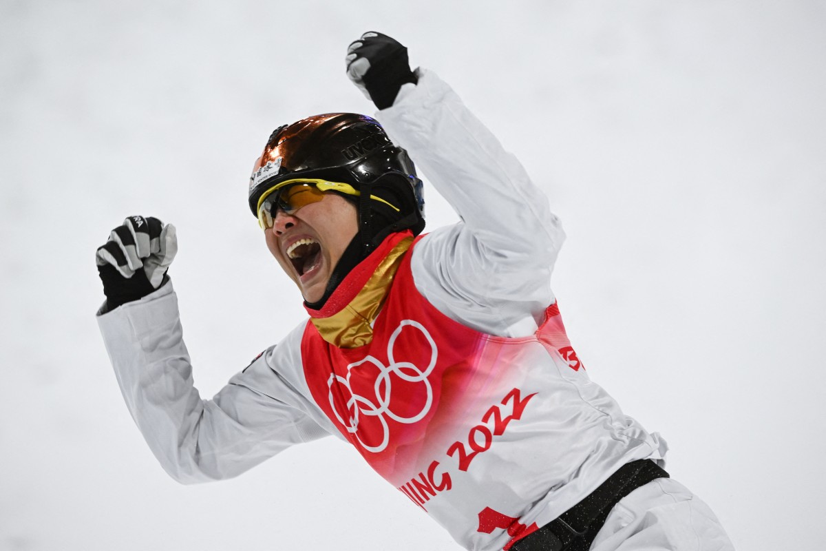 China’s Xu Mengtao celebrates winning the freestyle skiing women’s aerials. Photo: AFP
