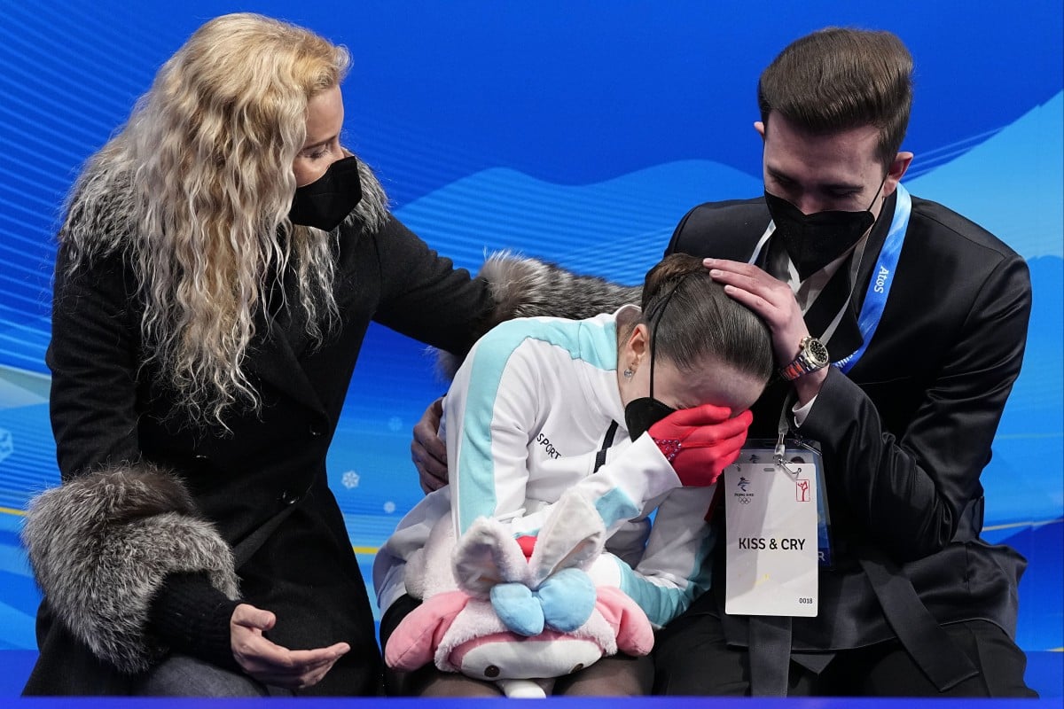 Winter Olympics: tearful Russian figure skater Kamila Valieva misses out on medal after free skate falls – day 13, as it happened