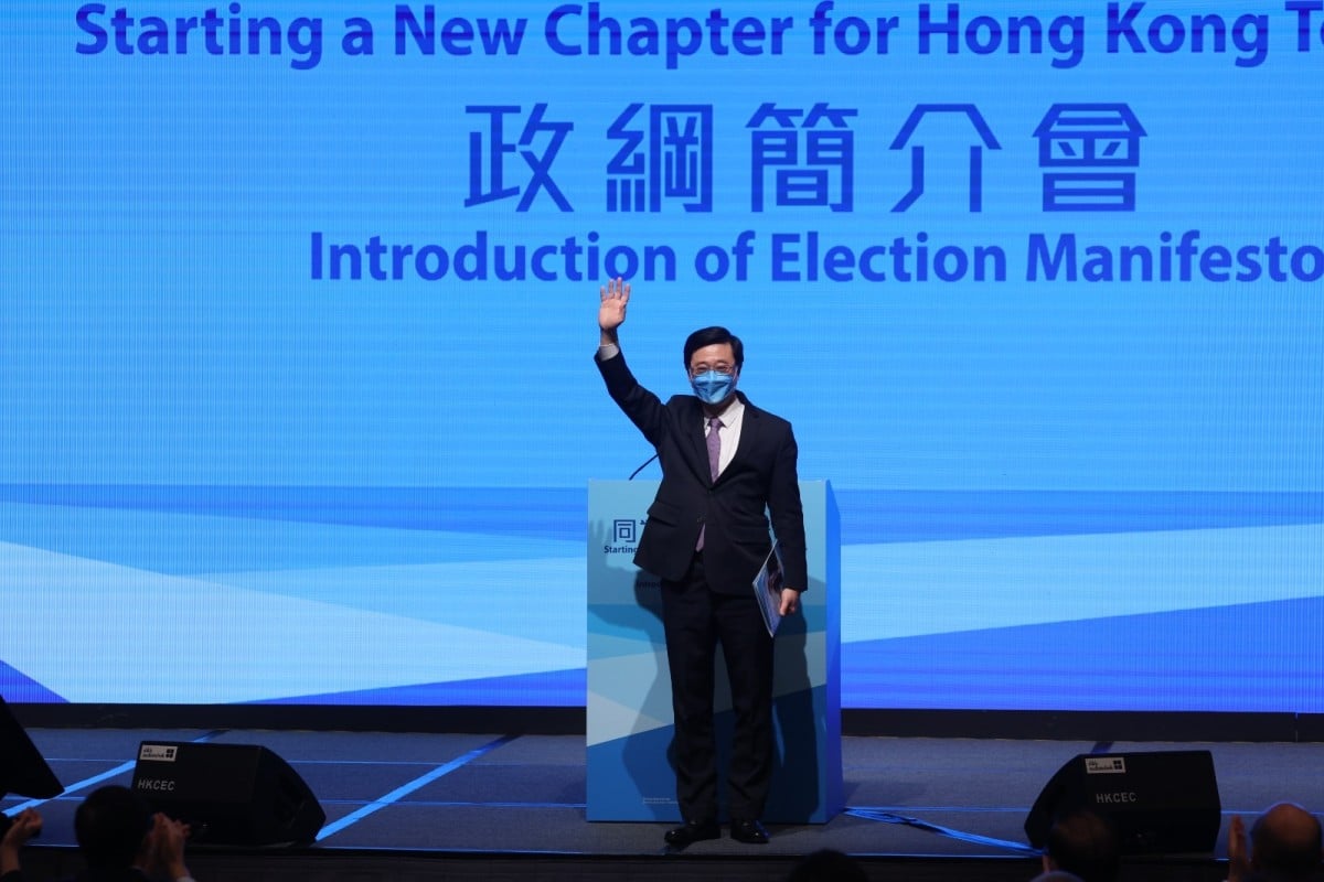 Chief executive candidate John Lee presented his platform at a press conference at the Hong Kong Exhibition and Convention Centre. Photo: Yik Yeung-man