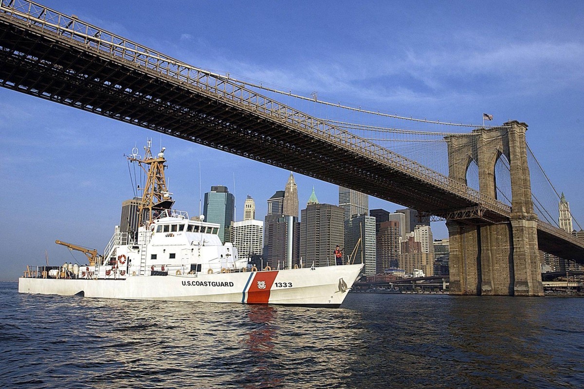 The US Coast Guard cutter Adak patrols near the Brooklyn Bridge in New York. Photo: AFP