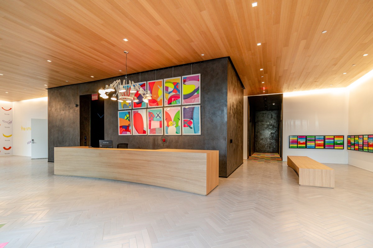 Colourful art in the lobby of The Smile, a New York rental building by Danish architecture firm BIG (Bjarke Ingels Group) illustrate a new trend for curated works in high-end residential developments. Photo: Noise