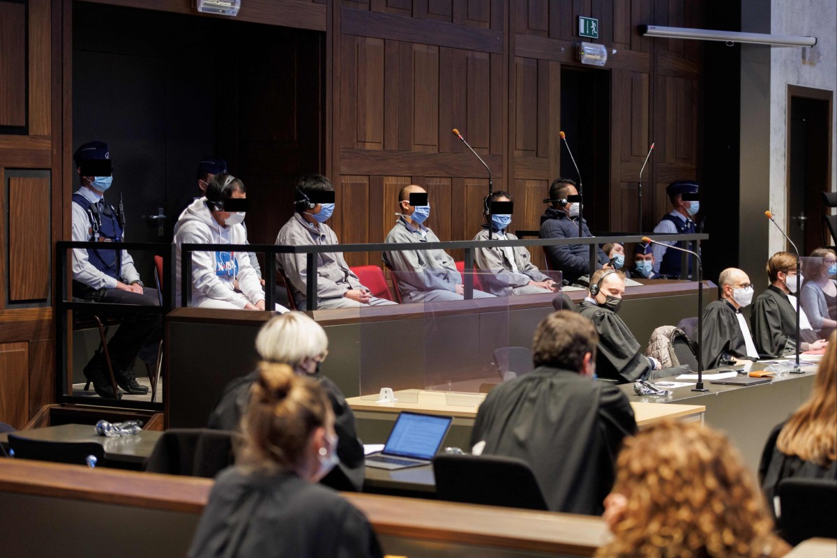 Defendants at the opening of the human-smuggling trial in Bruges, Belgium. Photo: AFP