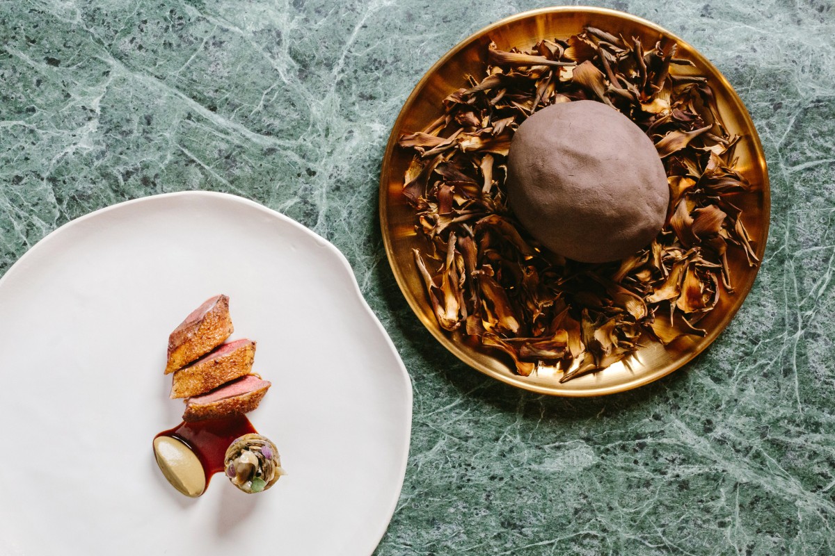 An Estro, the pigeon is “a performance on a plate with the bird wrapped in fig leaves and cooked in clay, and the chef opens it table”, writes Lisa Cam. Photo: Estro