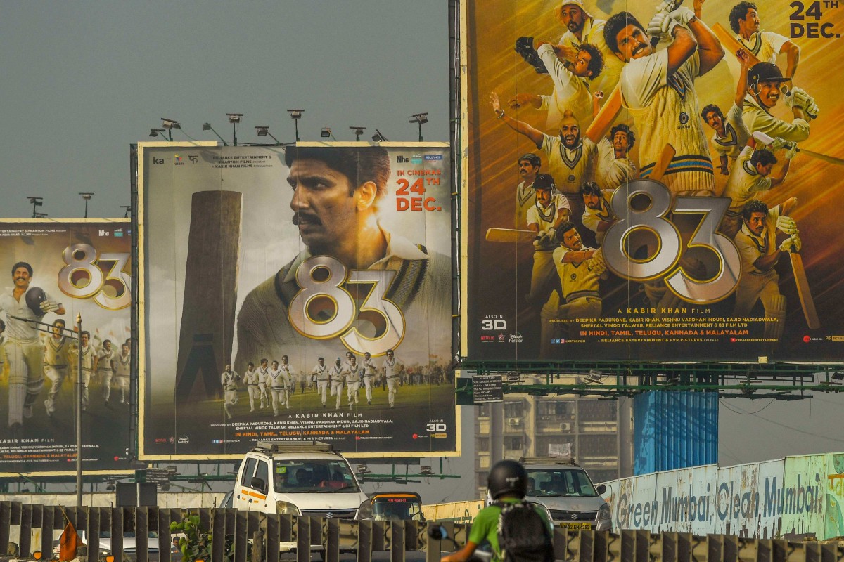Massive billboards promoting the cricket movie ‘83’ line the streets of Mumbai, with film retelling India’s stunning victory at the 1983 World Cup. Photo: AFP