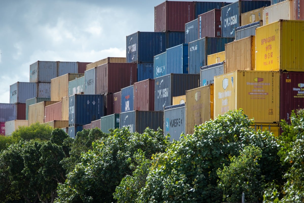 Shipping containers sit stacked at the Port of Brisbane, Australia. Photo: Bloomberg