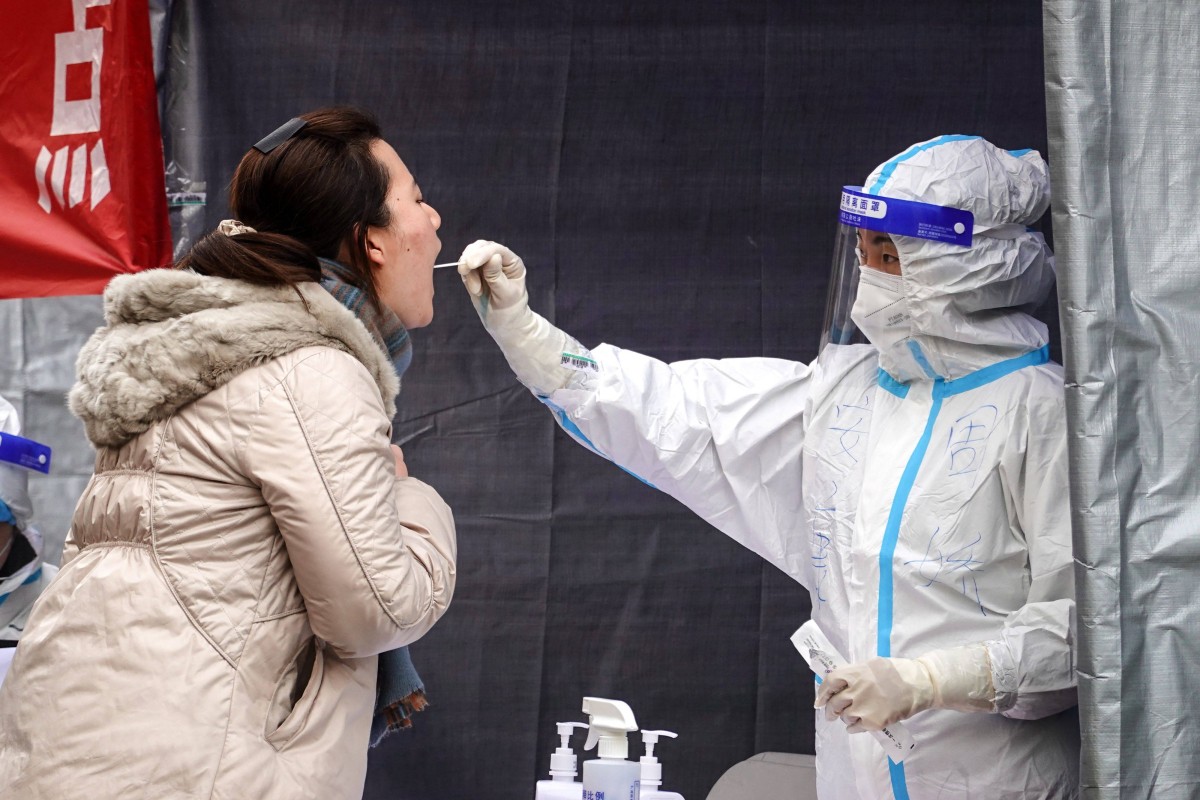 A resident undergoes a Covid-19 test in Xian. Photo: AFP