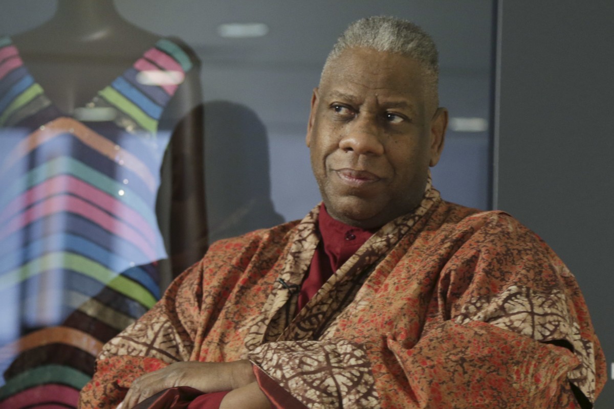 FILE - André Leon Talley, a former editor at large for Vogue magazine, speaks to a reporter at the opening of the “Black Fashion Designers” exhibit at the Fashion Institute of Technology in New York, Tuesday, Dec. 6, 2016. Talley, the towering former creative director and editor at large of Vogue magazine, has died. He was 73. Talley’s literary agent confirmed Talley’s death to USA Today late Tuesday, Jan. 18, 2022. (AP Photo/Seth Wenig, File)