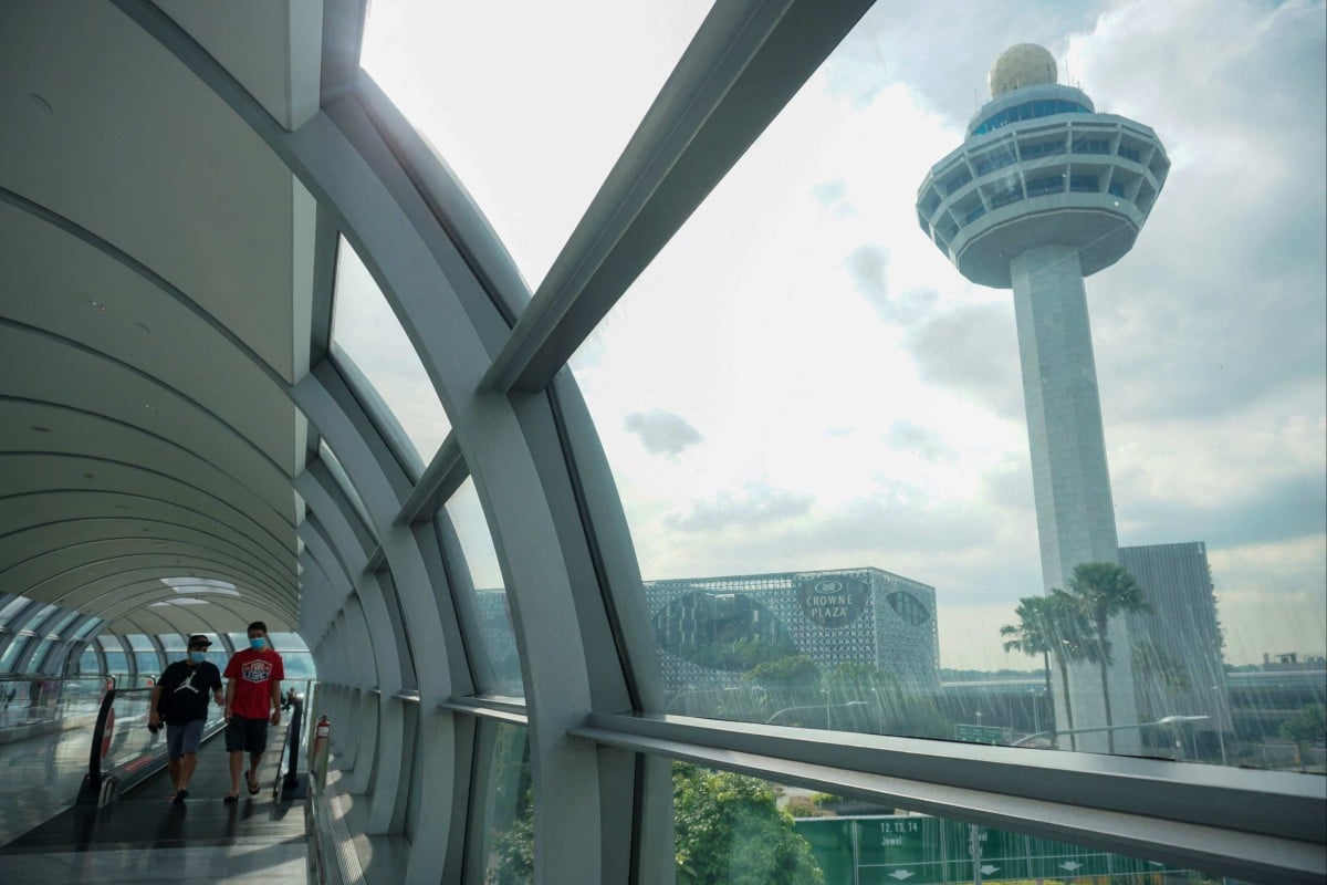 Travellers at Changi International Airport in Singapore. Photo: AFP