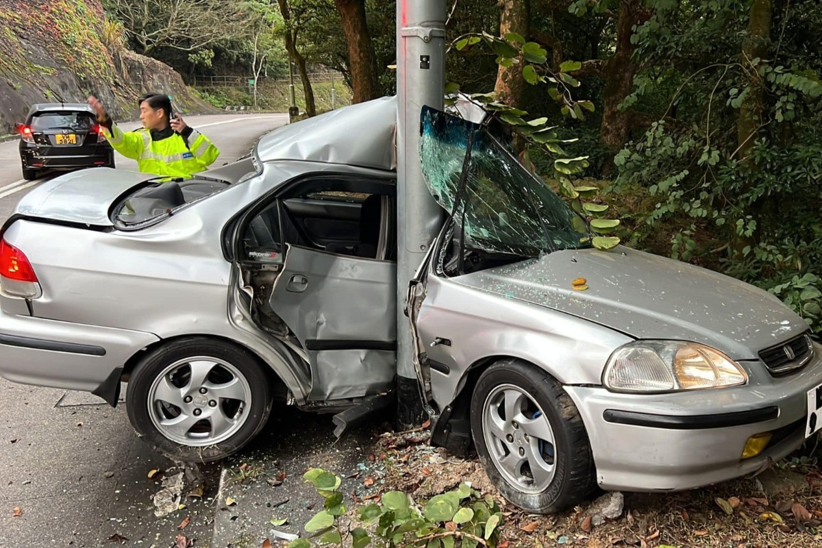 A driver was killed after his car crashed into a lamp post on a highway in Tsuen Wan. Photo: Handout