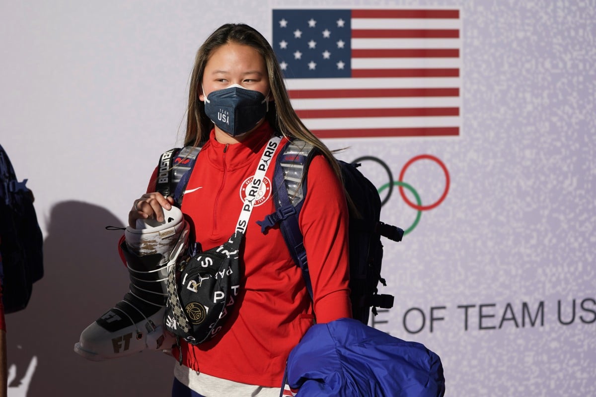 Moguls skier Kai Owens waits to board a plane on Thursday in Los Angeles en route to Beijing for the Olympics. Photo: AP