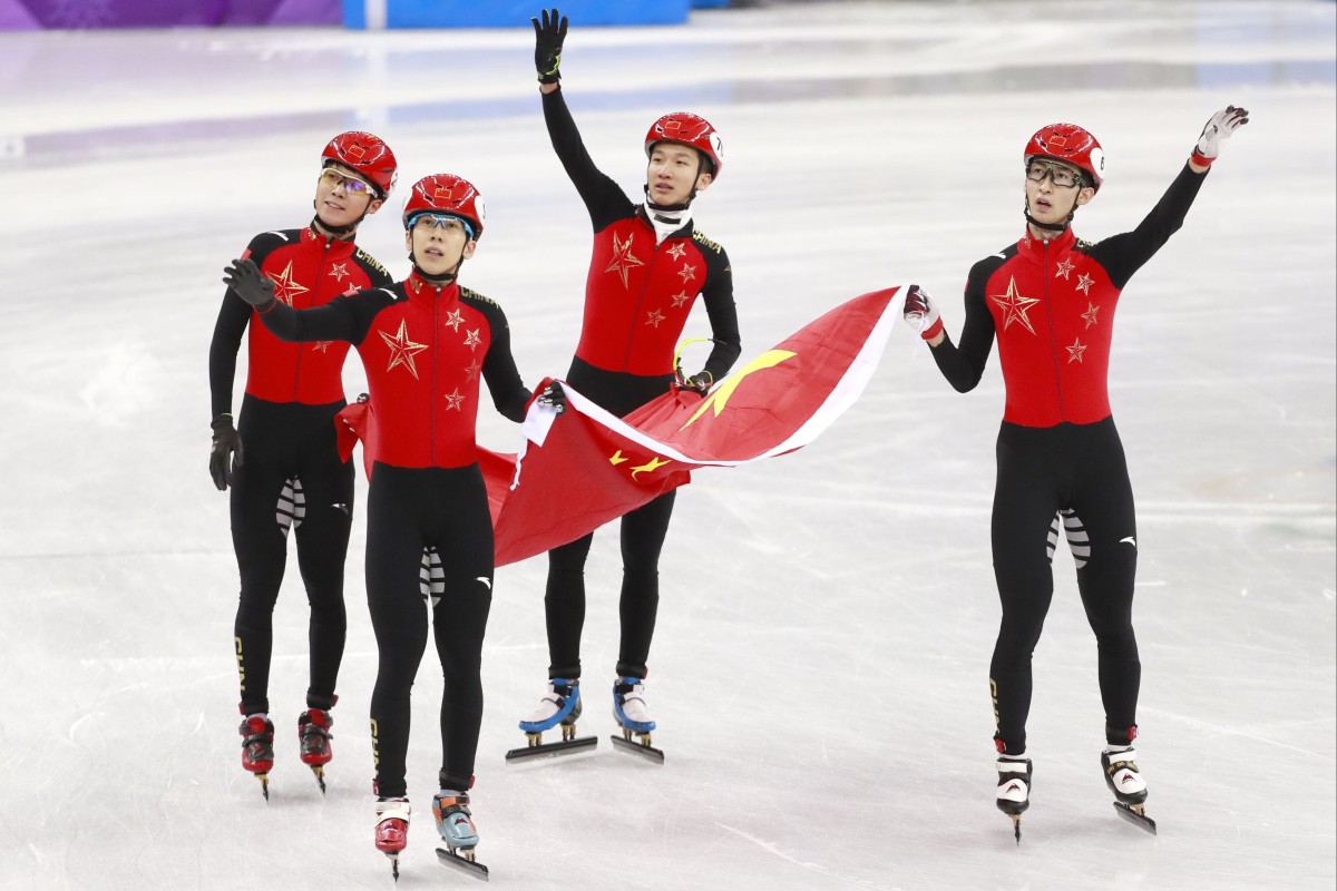 Silver medalists Wu Dajing (right) Han Tianyu (second left) Chen Dequan (left) and Xu Hongzhi of China react after the men’s short-track speedskating 5,000m relay final at the Pyeongchang 2018 Olympic Games. Photo: EPA-EFE