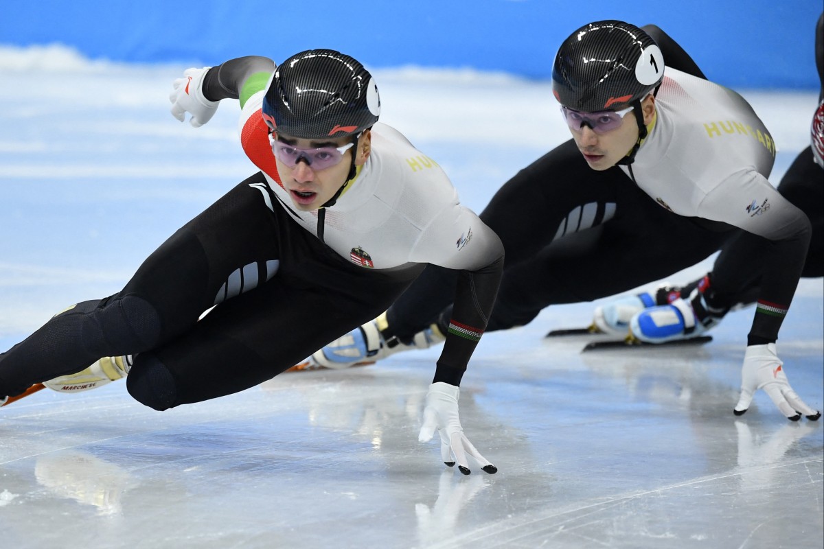 Brothers Liu Shaoang (left) and Sandor Liu Shaolin race against each other at the Beijing Winter Olympics. Photo: Reuters