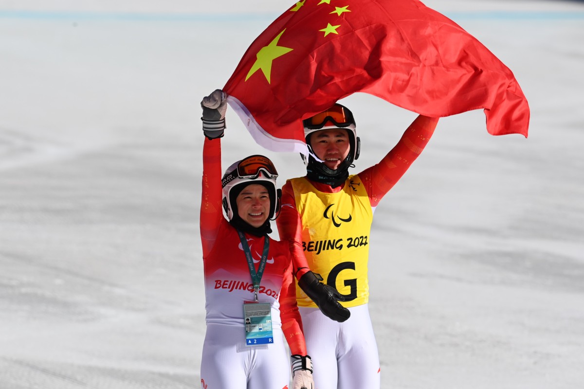 China’s Zhu Daqing and guide Yan Hanhan after the Beijing Winter Paralympic Game Para Alpine skiing women’s downhill vision impaired qualifier event at the National Alpine Skiing Center in Yanqing. Photo: Xinhua   