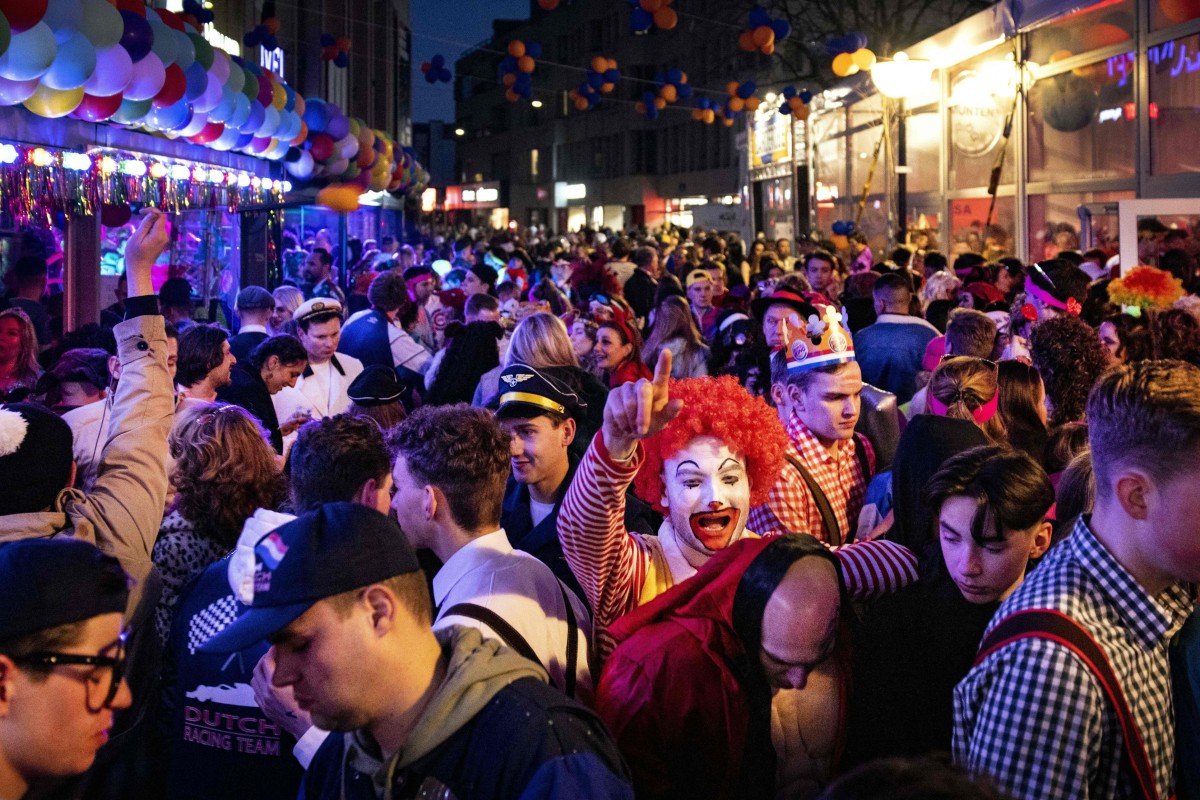 Partygoers enjoy a carnival in Eindhoven, the Netherlands, in late February, after the easing of pandemic rules. Photo: AFP
