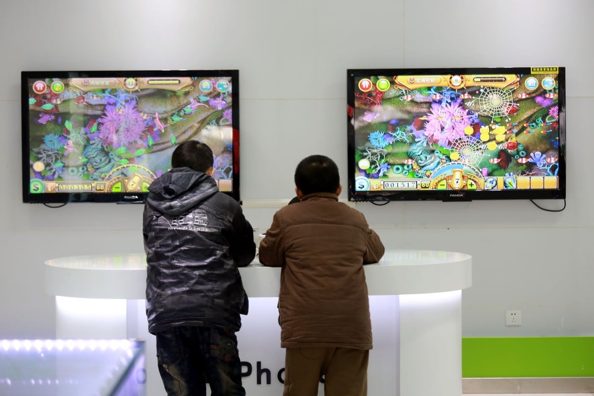 Children playing video games in a mobile phone shop in Nanchang, China. Photo: Shutterstock Images