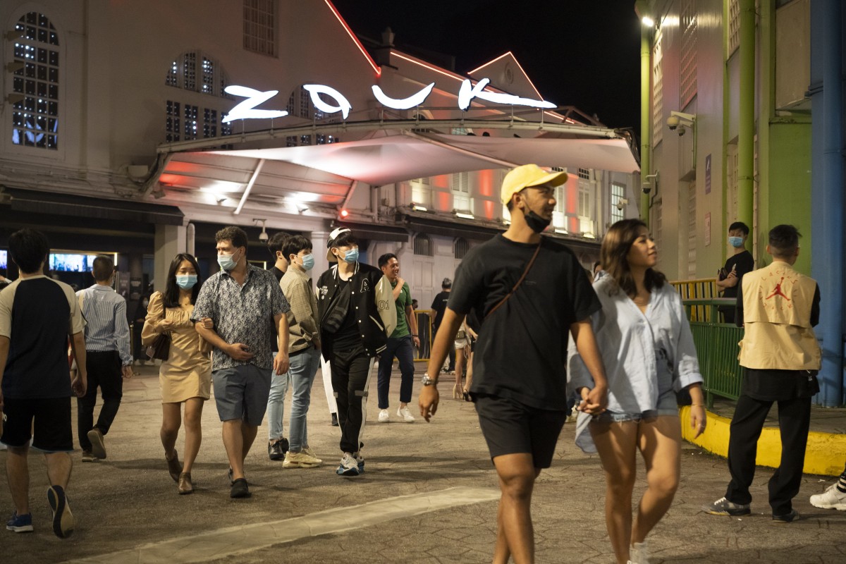 Crowds outside the Zouk nightclub at Clarke Quay in Singapore. Photo: Bloomberg