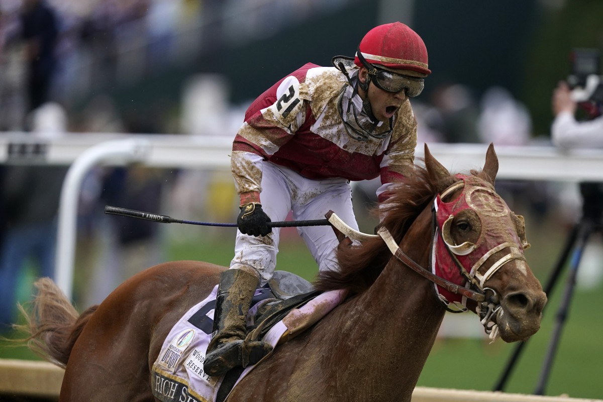 Sonny Leon celebrates after riding Rich Strike past the finish line to win the 148th running of the Kentucky Derby horse race at Churchill Downs in Louisville, Kentucky on Saturday. Photo: AP 