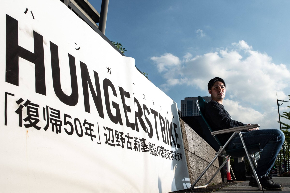Anti-US military base activist and native Okinawan Jinshiro Motoyama sits during the third day of his hunger strike outside the Ministry of Land, Infrastructure, Transport and Tourism in Tokyo on Wednesday, ahead of the 50th anniversary of the US return of Okinawa to Japan. AFP: Photo