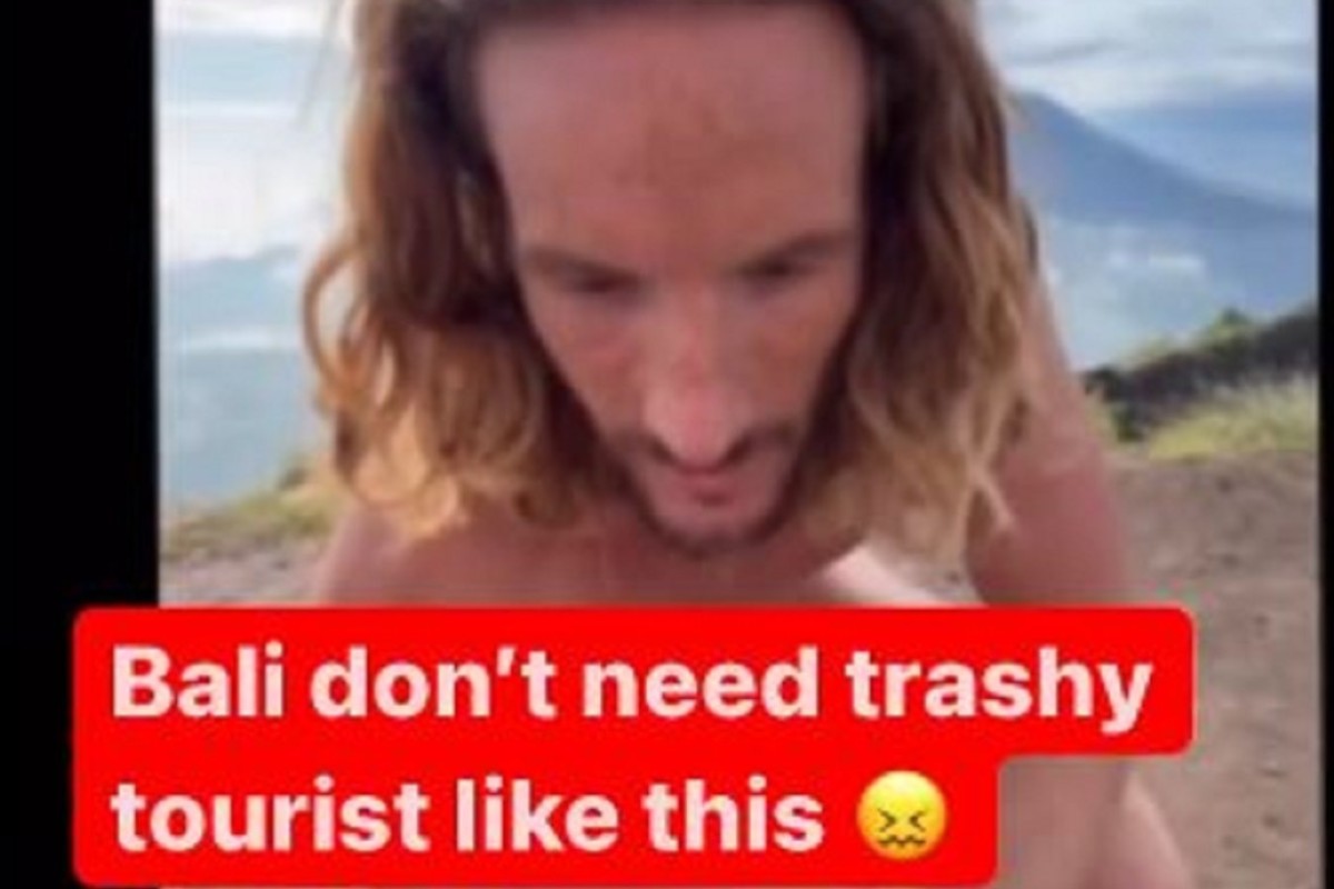 A still image taken from Niluh Djelantik’s Instagram video calling for “trashy tourists” to go home, showing Canadian Jeffrey Craigen, who was deported from Bali for dancing naked on top of a mountain. Photo: Instagram