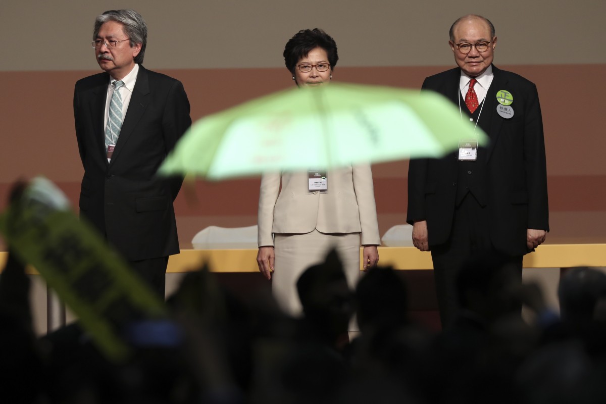 Carrie Lam (centre) wins the chief executive race on March 26, 2017, beating John Tsang (left) and retired judge Woo Kwok-hing. Photo: Robert Ng
