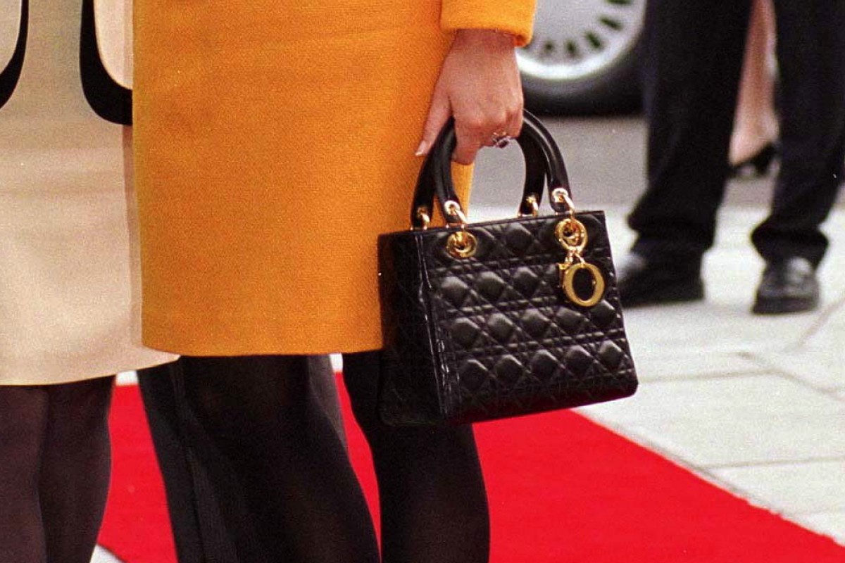 Princess Diana carries a Lady Dior handbag at a public engagement in Liverpool, in the UK. Photo: Getty Images