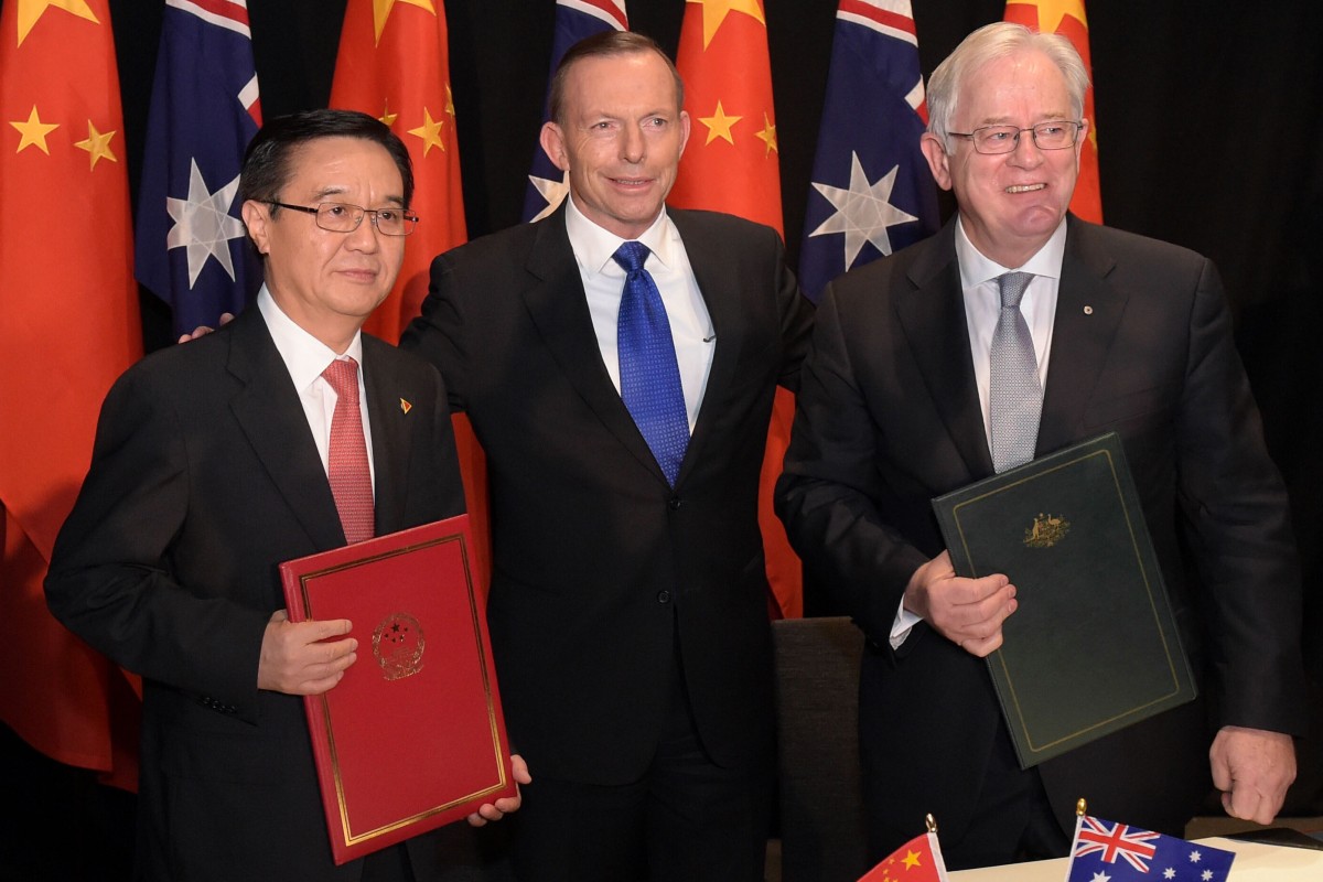 China’s then commerce minister Gao Hucheng (left) and Australia’s then prime minister Tony Abbott (centre) and minister for trade Andrew Robb pose for a photo after signing a free trade agreement between the two countries on June 17, 2015, in Canberra, Australia. The era of enthusiasm and optimism from the wider world over engagement with China appears to be at an end, representing a loss for all sides. Photo: Getty Images