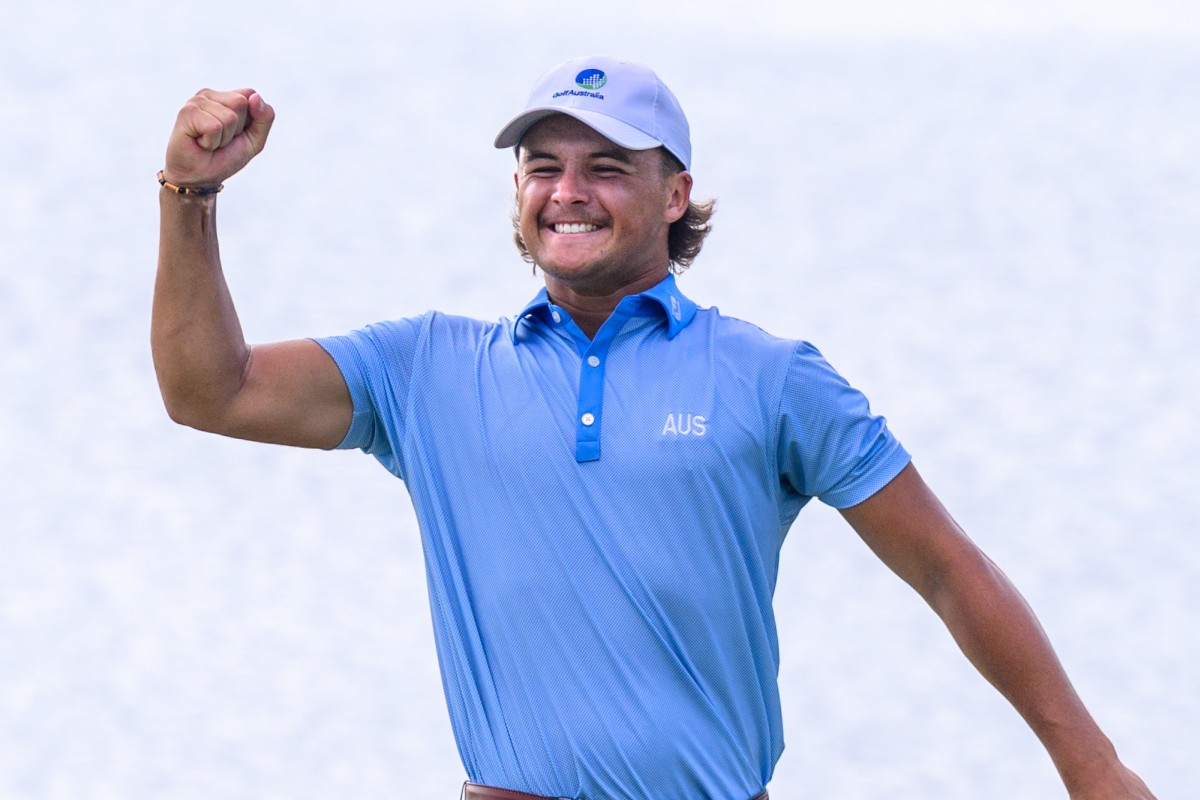 Harrison Crowe of Australia celebrates winning the 2022 Asia-Pacific Amateur Championship on the 18th green at the Amata Spring Country Club in Thailand. Photo: AAC