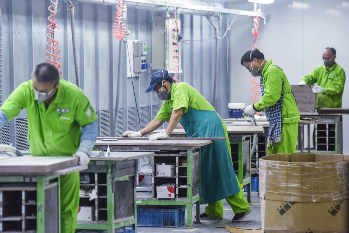 Factory workers build furniture in Hangzhou, Zhejiang province, which falls within China’s Yangtze River Delta. Photo: AFP