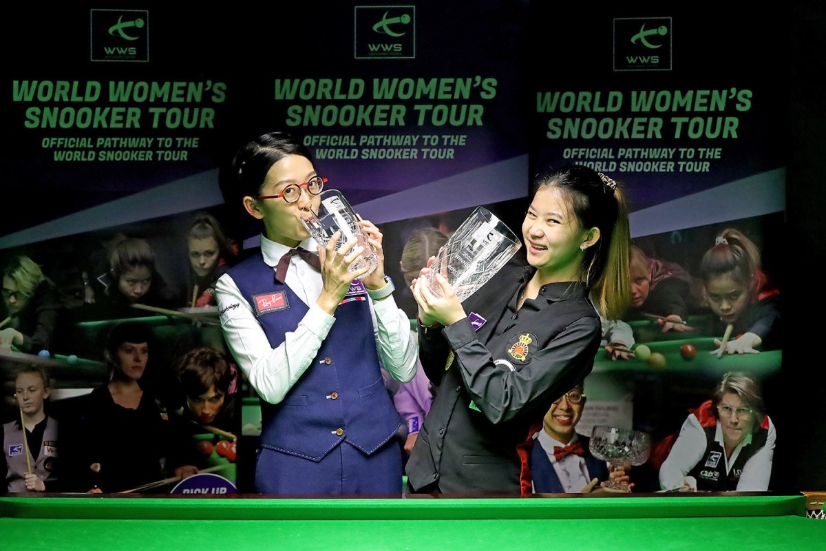 Ng On-yee and Mink Nutcharut of Thailand celebrate with their glass trophies at the Eden Women’s Masters. Photo: WWS