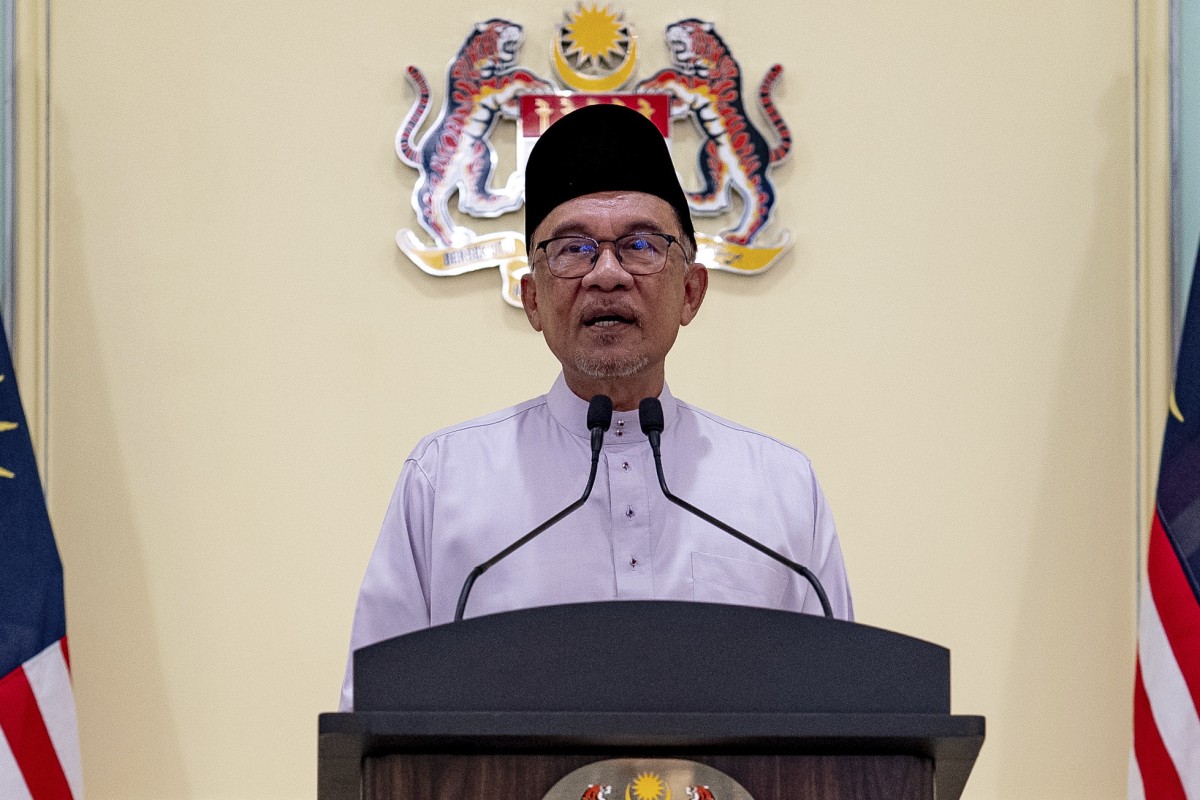 Malaysia’s new leader Anwar Ibrahim during a press conference on his first day at the prime minister’s office in Putrajaya on Friday. Photo: Prime Minister’s Office of Malaysia via AP
