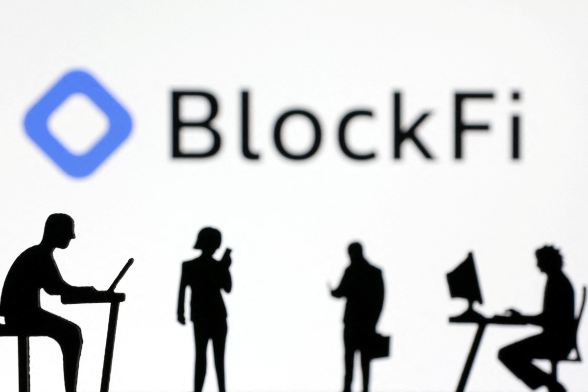 Figurines with smartphones and computers seen in front of the BlockFi logo in this illustration taken November 28, 2022. Photo: Reuters