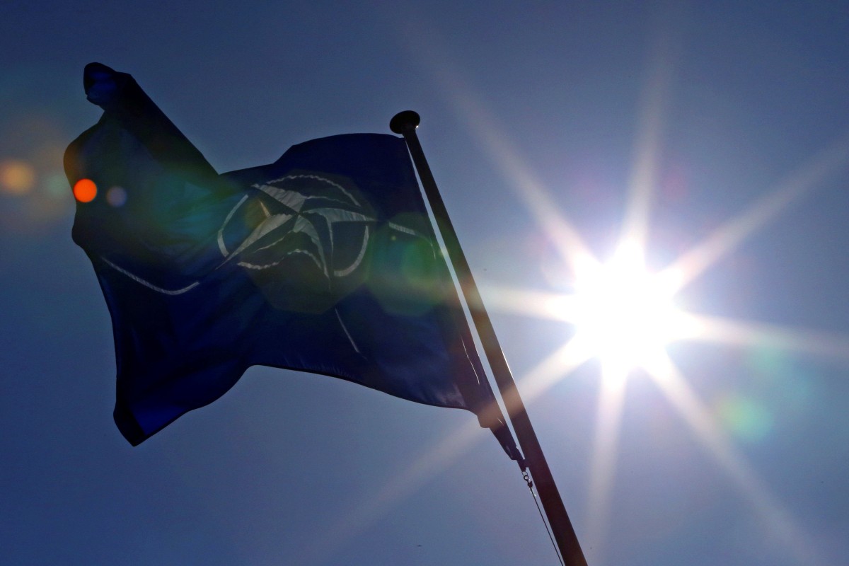 A Nato flag flies at the transatlantic security alliance’s headquarters in Belgium. Photo: Reuters
