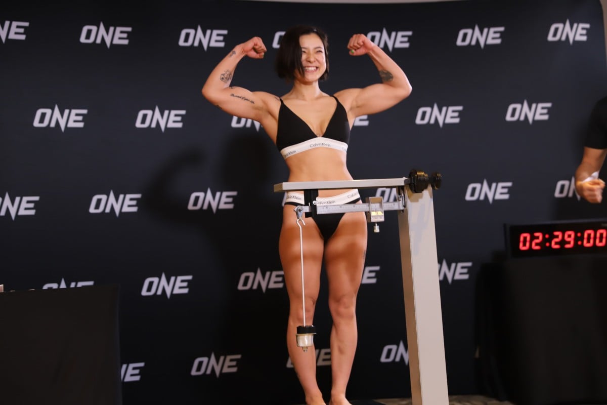 Itsuki Hirata poses on the scale after make weight for ONE Fight Night 8 in Singapore. Photos: ONE Championship
