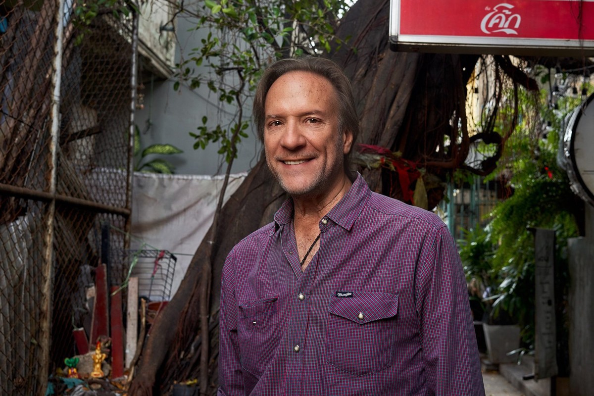 Joe Cummings, the author of the first Lonely Planet Thailand travel guide, in front of the oldest guesthouse on Bangkok’s Khao San Road. Photo: Ian Taylor