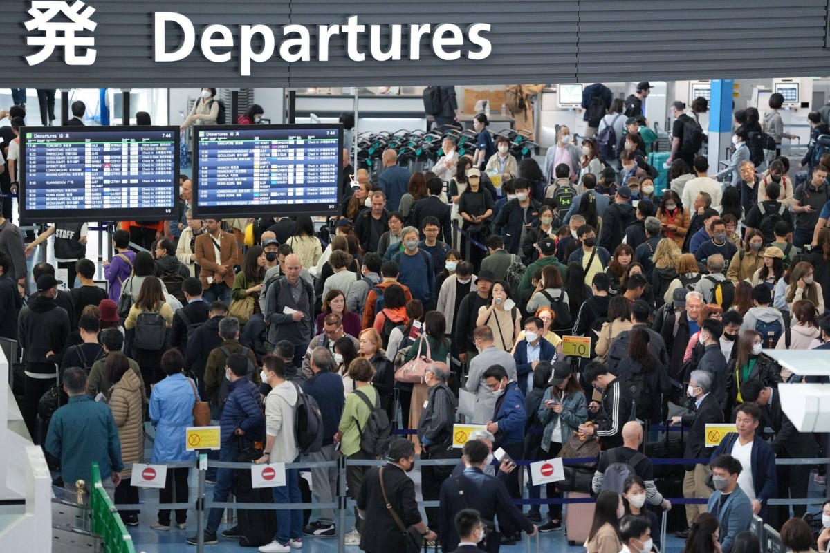 Travellers at Haneda Airport in Tokyo. Millions of people in Japan are on the move for the “golden week” holidays. Photo: Bloomberg